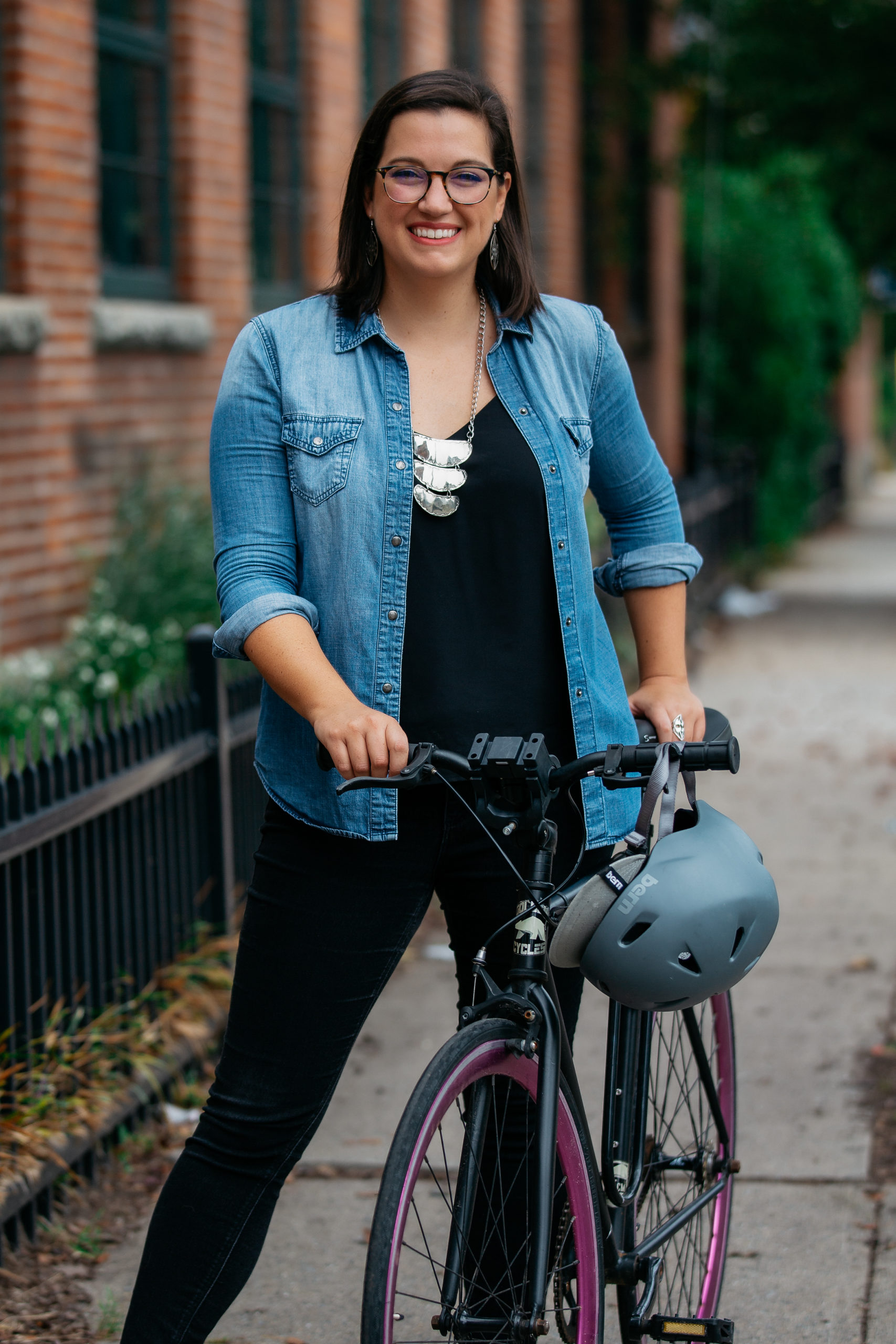 Adrienne Keene with her bicycle