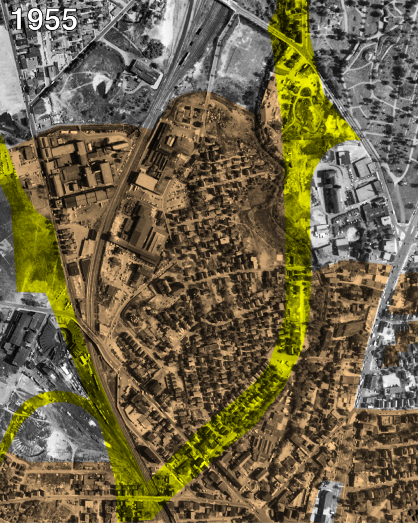 Side by Side aerial views of the same area. One is labeled 1955 and shows a thickly settled residential area bounded by narrow train tracks, a winding river, and a cemetery.